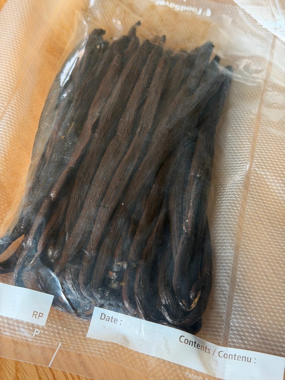 Vanilla pods stored in a sealed glass jar